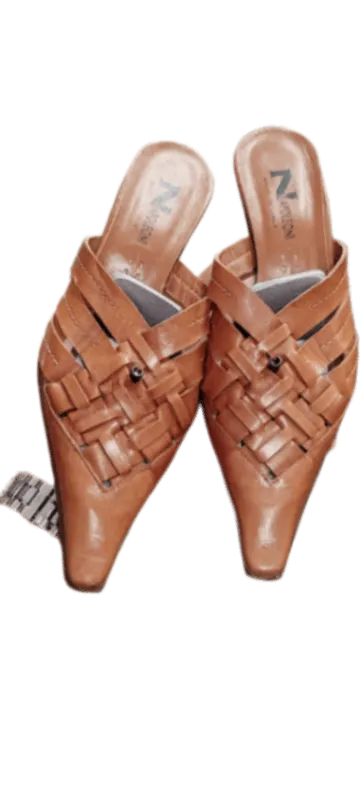 Lavorazione artigianale scarpe e borse prima e dopo
